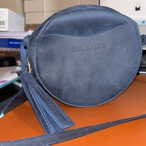 Portland Leather Goods Deep Water Blue small Circle Crossbody. + tassel